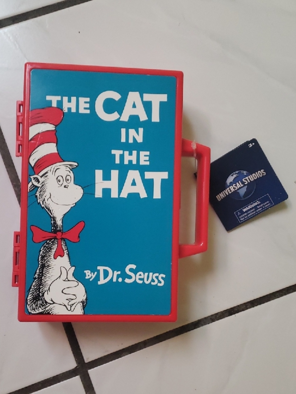 Brand new "Dr. Seuss" plastic lunchbox with 4 figures, one accessory